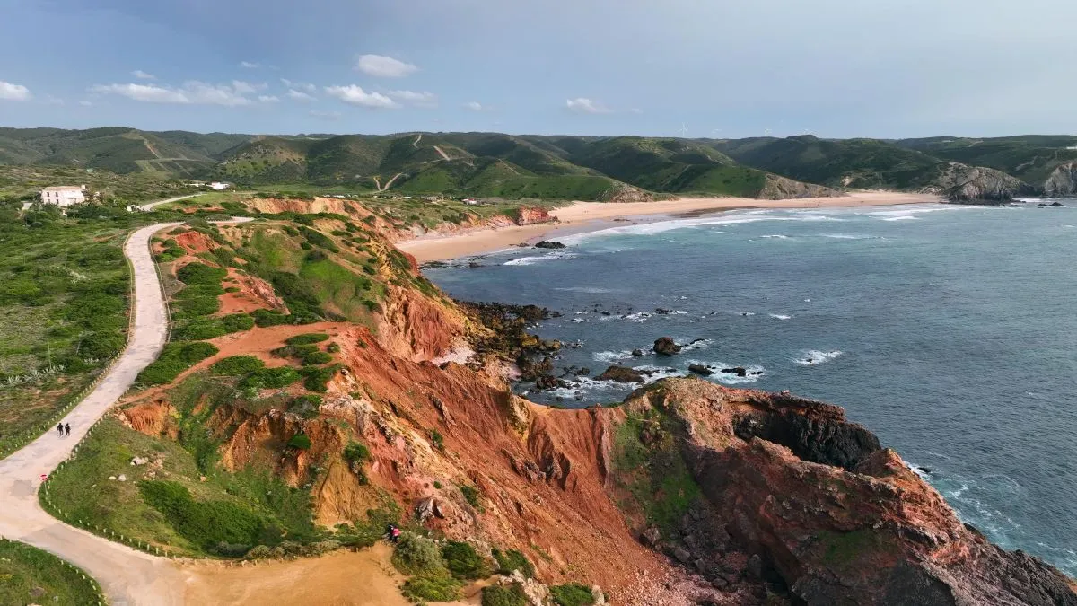 aerial view of the waves in the atlantic ocean at the carrapateira