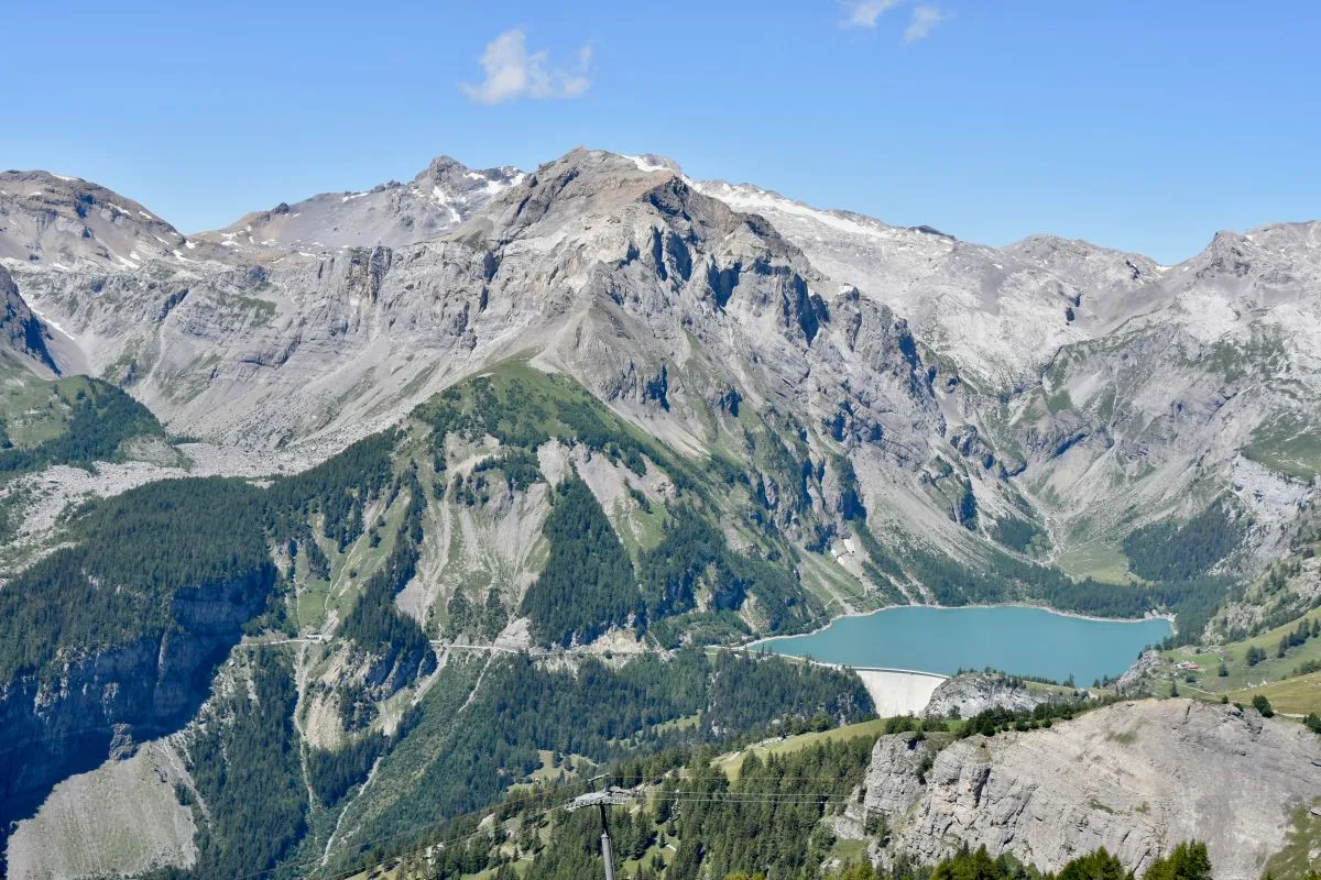swiss alps with tseuzier lake and dam in valais