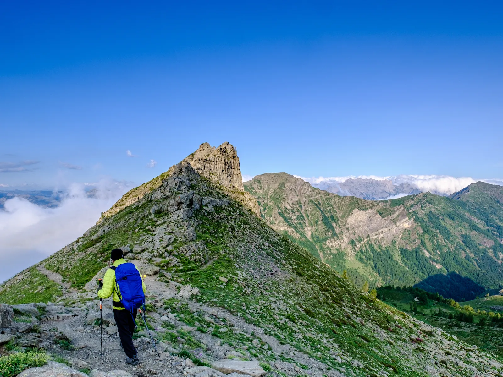 hiker reaching a pass in the ecrins national park french alpshiker reaching a pass in the ecrins national park french alps copie