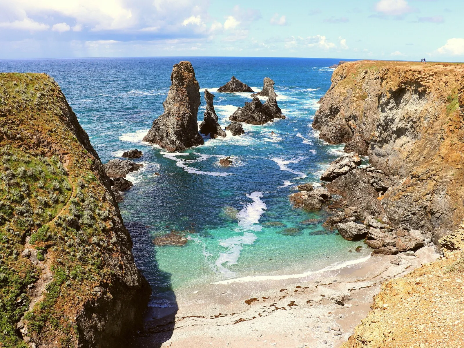 aerial view of the dramatic les aiguilles de port coton cliff france belle ile en mer
