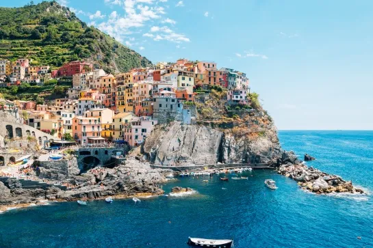 seaside village manarola colorful buildings and beach in cinque terre italy copie